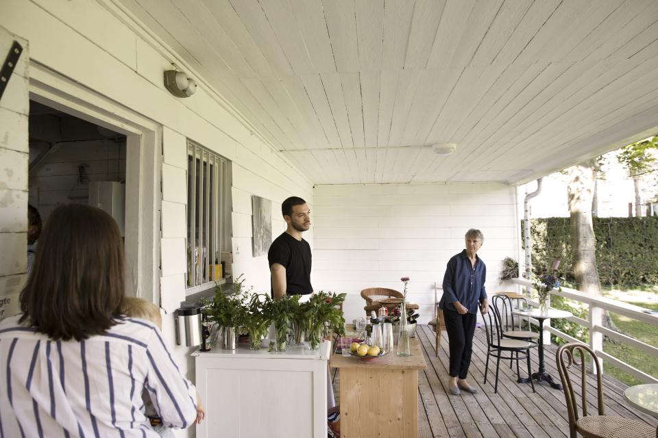 artist singing on veranda 