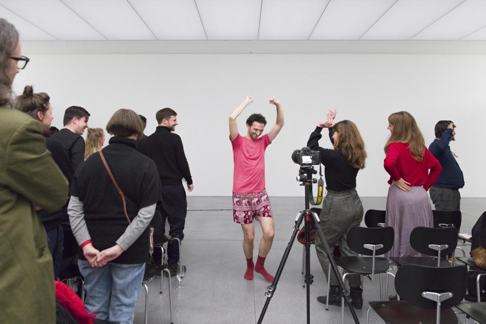 performer dancing among audience